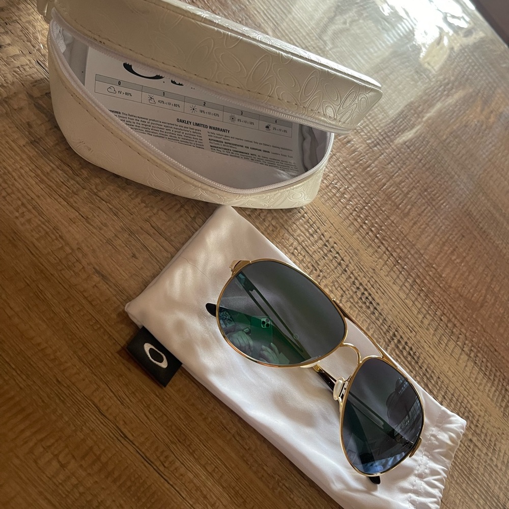 Oakley, Caveat Gold/Green
